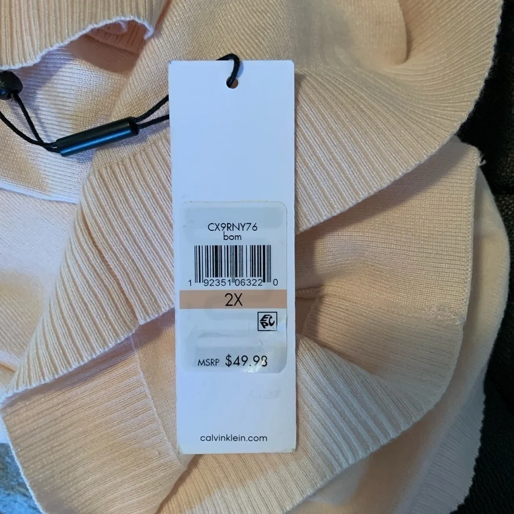 Calvin Klein NWT shrug light peach color